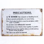 A White enamel sign "Precautions A W Bombs", width 30cm, height 20cm