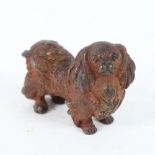 A miniature cold painted bronze Pekingese dog figure, length 5cm, height 4cm