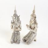 A pair of silver plated Thai kneeling praying deity figures, height 22cm
