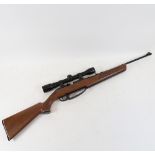 A Daisy Powerline 900 .177 calibre air rifle, with 4x32 telescopic scope and under-lever action,
