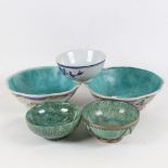 A pair of Chinese bowls with floral decoration, 17cm across, a signed blue and white bowl on foot, a