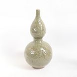 A Chinese celadon crackle glaze double-gourd vase, with incised floral decoration, height 33cm