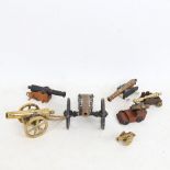 A group of miniature brass table cannons, largest length 12cm (7)