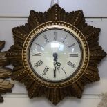 A Vintage Smiths gilded electric wall clock, 24cm diameter