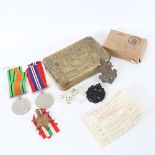 A First World War Princess Mary 1914 Christmas tin, a set of 3 Second World War Service medals,