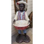 A Vintage composition Blackamoor boy figure holding a bowl, height 95cm