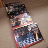 Various Star Wars toys and games, including chess set, Star Wars Episode One monopoly, Invasion of