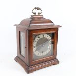 A walnut-cased 3-train mantel clock, by Sanders & Co London, width 22cm