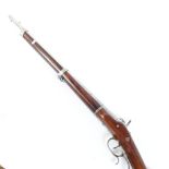A single-barrelled percussion sporting gun, no maker's marks, with mahogany mounts, overall length