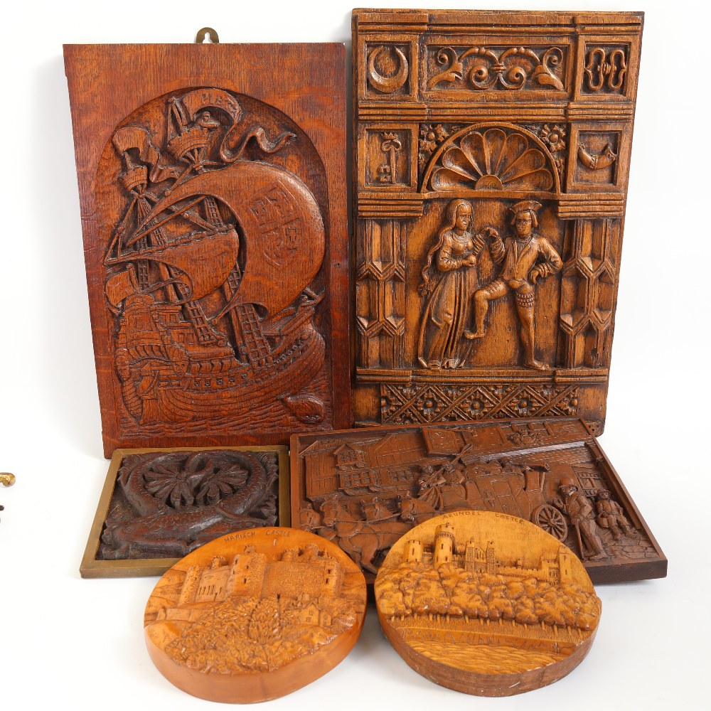 A group of 6 carved hardwood and resin wall plaques, including oak shipping example, largest