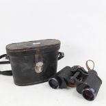 A leather-cased Carl Zeiss Jena multi-coated 8x30 binoculars