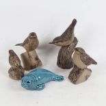 4 Poole Pottery birds, tallest 17cm, and a Poole seal