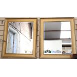 A modern pair of rectangular gilt-framed bevelled-edge wall mirrors, 74cm x 64cm