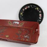 An Oriental painted wood tea tray with bird and floral design, length 57cm, a circular lacquered