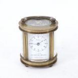 A modern Chinese oval brass-cased carriage clock, curved bevelled glass exhibition viewing plates,