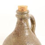 A Bellarmine style salt glaze stoneware wine flagon, height 24cm