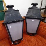 A pair of black painted metal lanterns with perspex panels, H75cm