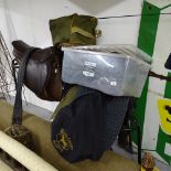 A quantity of horse riding equipment and accessories, to include 3 leather saddles, bridles,