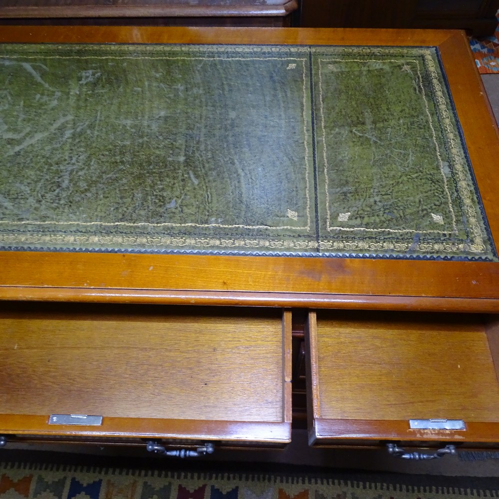 A reproduction yew wood twin-pedestal writing desk, W124cm, H77cm, D62cm, kneehole width 53cm and - Image 2 of 2