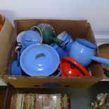 A quantity of blue, green and red enamelled pots, pans etc