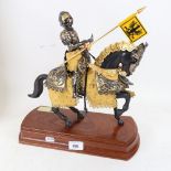 A brand new Armadura Siglo XVI knight on horseback figure, height 35cm