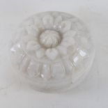 A heavy solid white marble/alabaster disc shaped carving, carved on both sides, diameter 25cm, cased