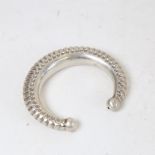 A Vintage Tribal/Ethnic Indian unmarked white metal bangle, 1.5oz