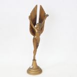 A gold painted spelter Art Deco style sculpture, nude winged lady, unsigned, height 35cm