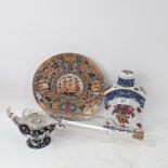 A Chinese export ceramic plate, with character mark on base, large blue and white floral tea caddy