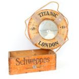 A Vintage stained pine Schweppes bottle box, and a novelty Titanic life ring mirror, diameter