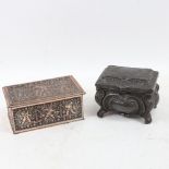 A Japanese silver plate on copper cherub box, and another Antique lead example, width 13cm (2)