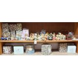 A large group of Enesco Cherished Teddies composition bear figurines, some boxed