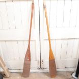 A Vintage pair of canoe paddles, length 152cm