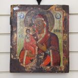 A large painted and lacquered Russian icon, depicting Madonna and Child, 35cm x 31cm