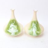 A pair of German Gebrueder Heubach bottle vases, signed GH and numbered 57, height 14cm