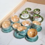A Vintage set of Japanese lustre eggshell porcelain teacups and saucers, and another similar set