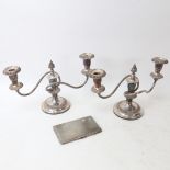A pair of mid-20th century silver plated 3-light candelabra, with military engraving for the Duke of