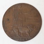 A First World War bronze death plaque/penny, awarded to Michael Nolan