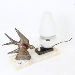 An Art Deco style marble table lamp, with spelter-mounted bird, signed Pepin, base length 22cm