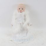 An Armand Marseille toy baby doll, with porcelain limbs, marked 341/4k, signed JE