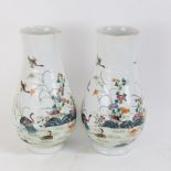A pair of Chinese famille rose ovoid 'Duck' vases, polychrome painted decoration with