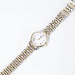 TISSOT - a lady's stainless steel quartz wristwatch, boxed