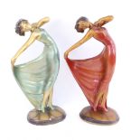 A pair of Art Deco style resin dancer sculptures, height 39cm