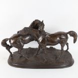 After Pierre-Jules Mene, a bronzed resin equestrian group sculpture, L'Accolade, signed, base length