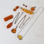 Various amber jewellery, including Baltic amber pendants, earrings, brooch etc
