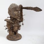 An African Tribal nail fetish idol figure, Nkisi Nkondi (Republic of Congo), oversized head set with