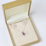 A modern 9ct gold amethyst heart pendant necklace