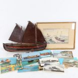 A Vintage painted metal half-hull boat money collection box, Contributions for the Royal National
