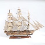 A handmade model frigate warship, with 18lb guns, on wood stand, overall length 82cm, overall height