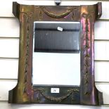 An Art Nouveau brass-framed rectangular bevel-edge wall mirror, with shaped frame and embossed